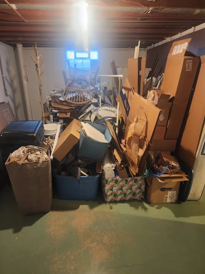 Roll-off dumpster container at job site for 20 Yard Dumpster Rental in Tioga